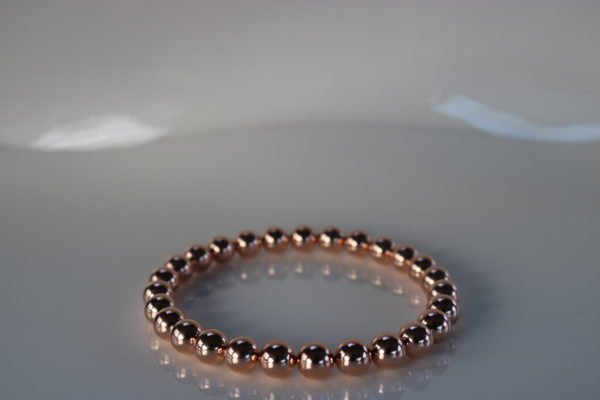 Ref 27 - Couleur Or Rose - Bracelet billes diamètre 8mm - Poignet 24 mailles : 60€, Cheville 32 mailles : 75€ et Collier 53 mailles : 130€